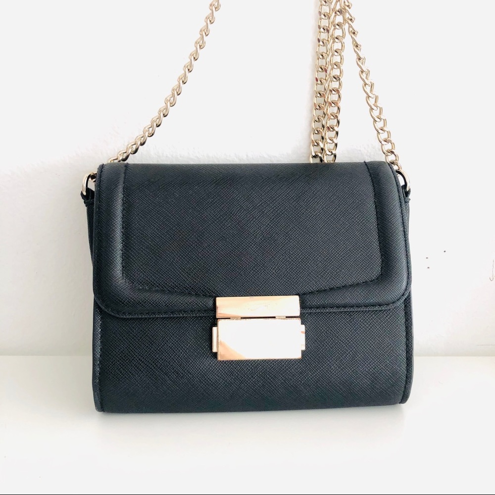 [h&m] leather clutch bag.